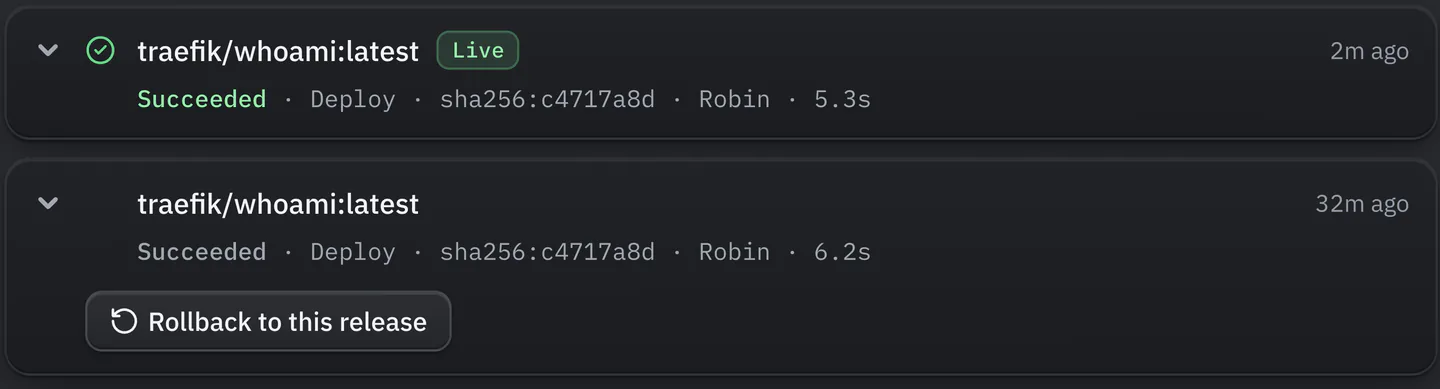 Two rows from a deployment list. The first is traefik/whoami:latest, tagged Live, succeeded, with its digest and who deployed it. The second is an earlier release with a Rollback to this release button.